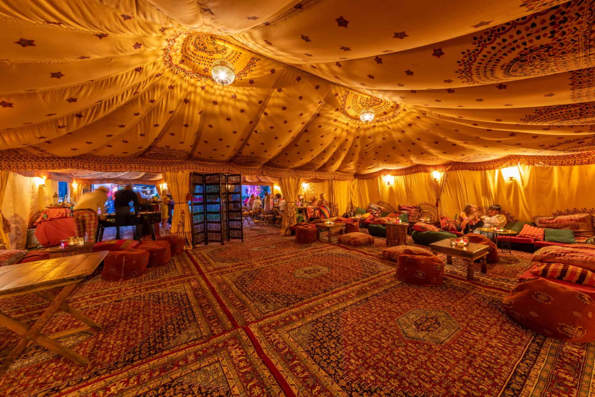 Inside an Arabian tent with persian rugs