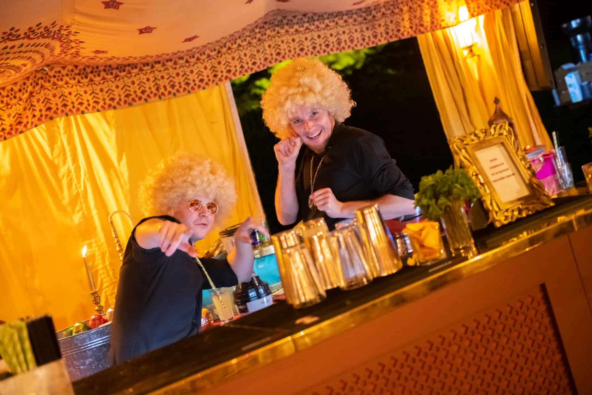 70s style bar staff at Arabian party