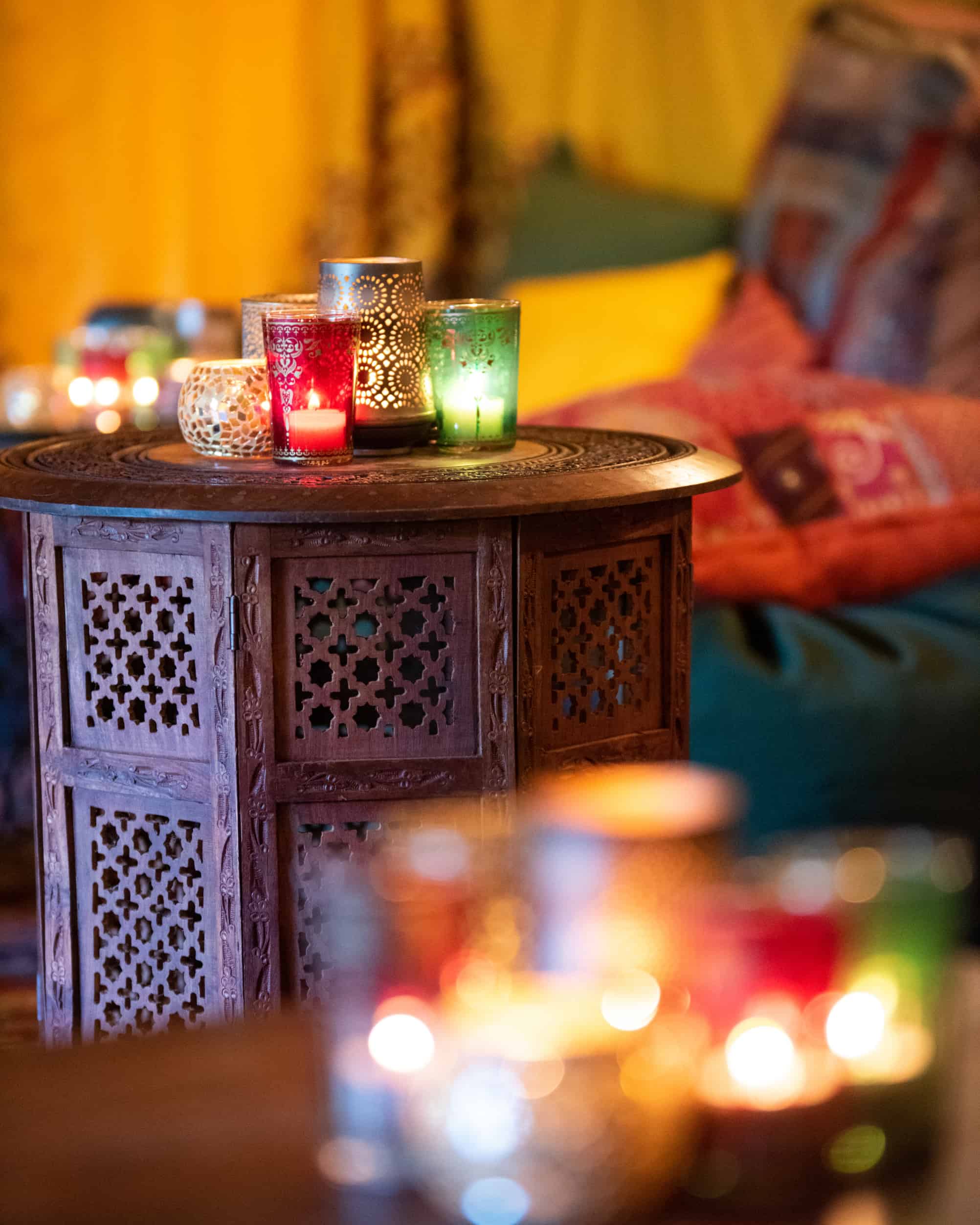 Arabian wooden tables and colourful candles