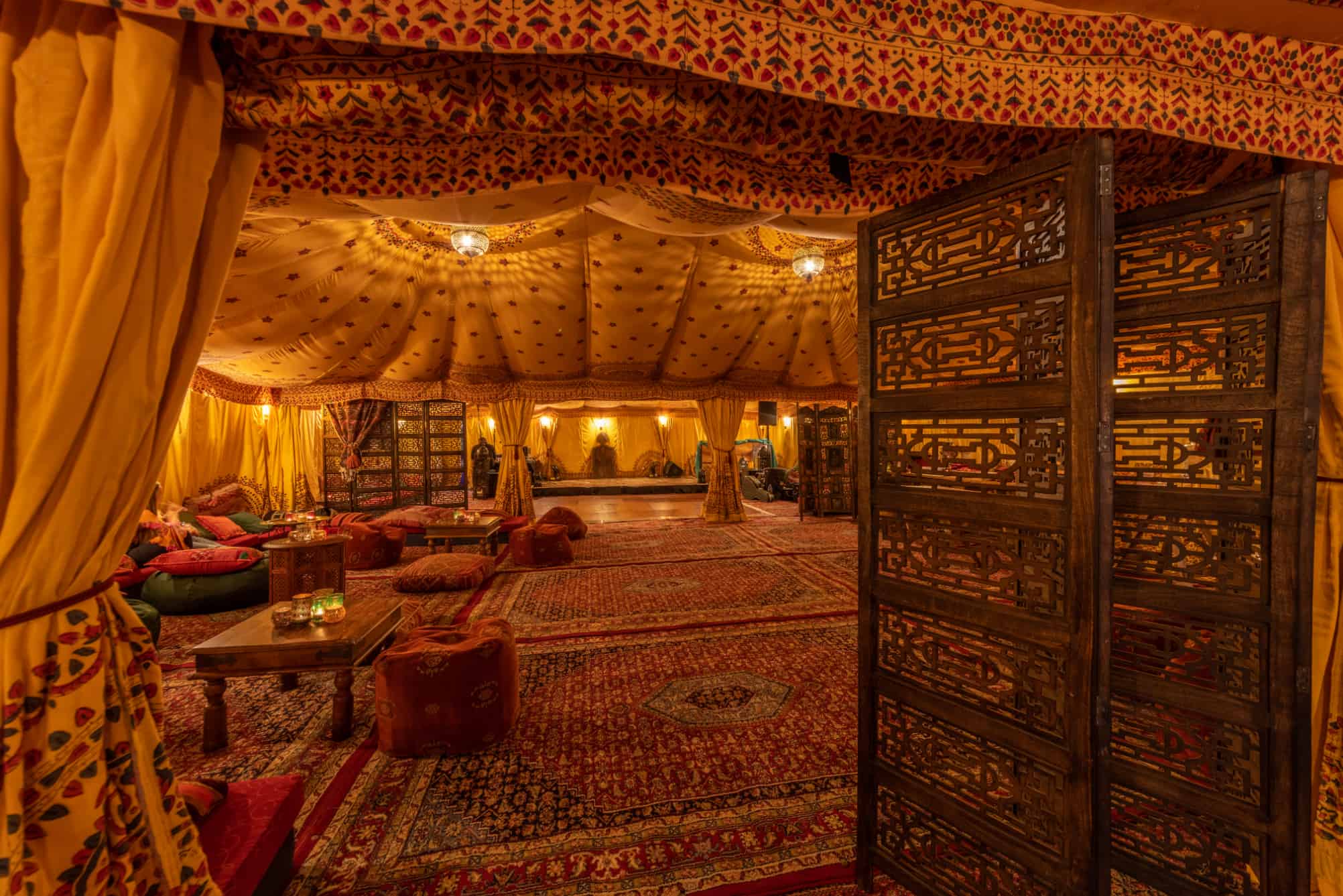 Inside an Arabian tent with wooden screens