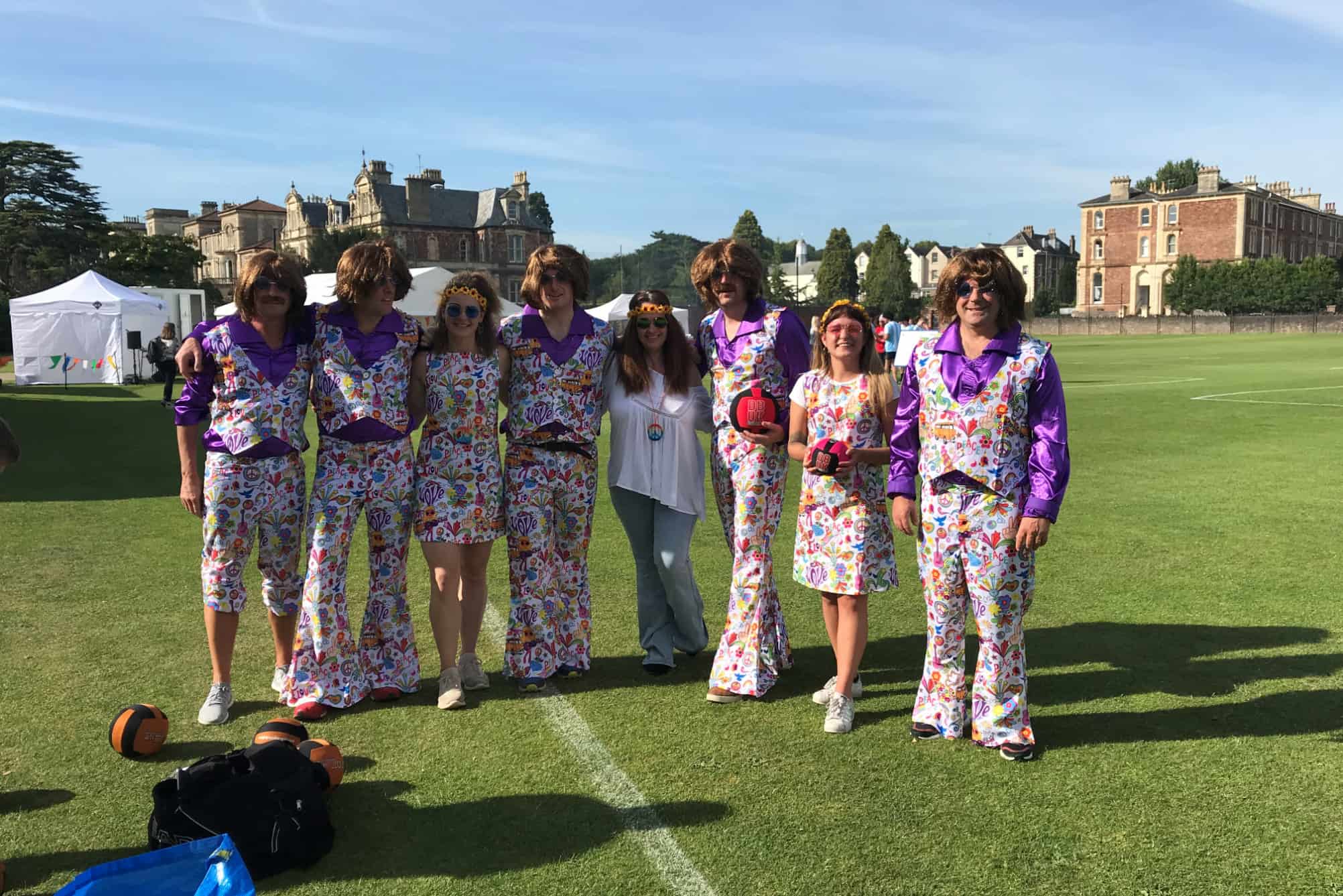 Dodgeball tournament participants dressed in 1970s fancy dress