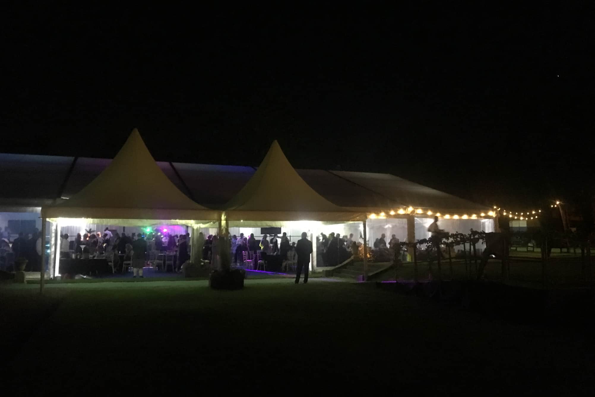 Marquee lit up at night at Badminton School