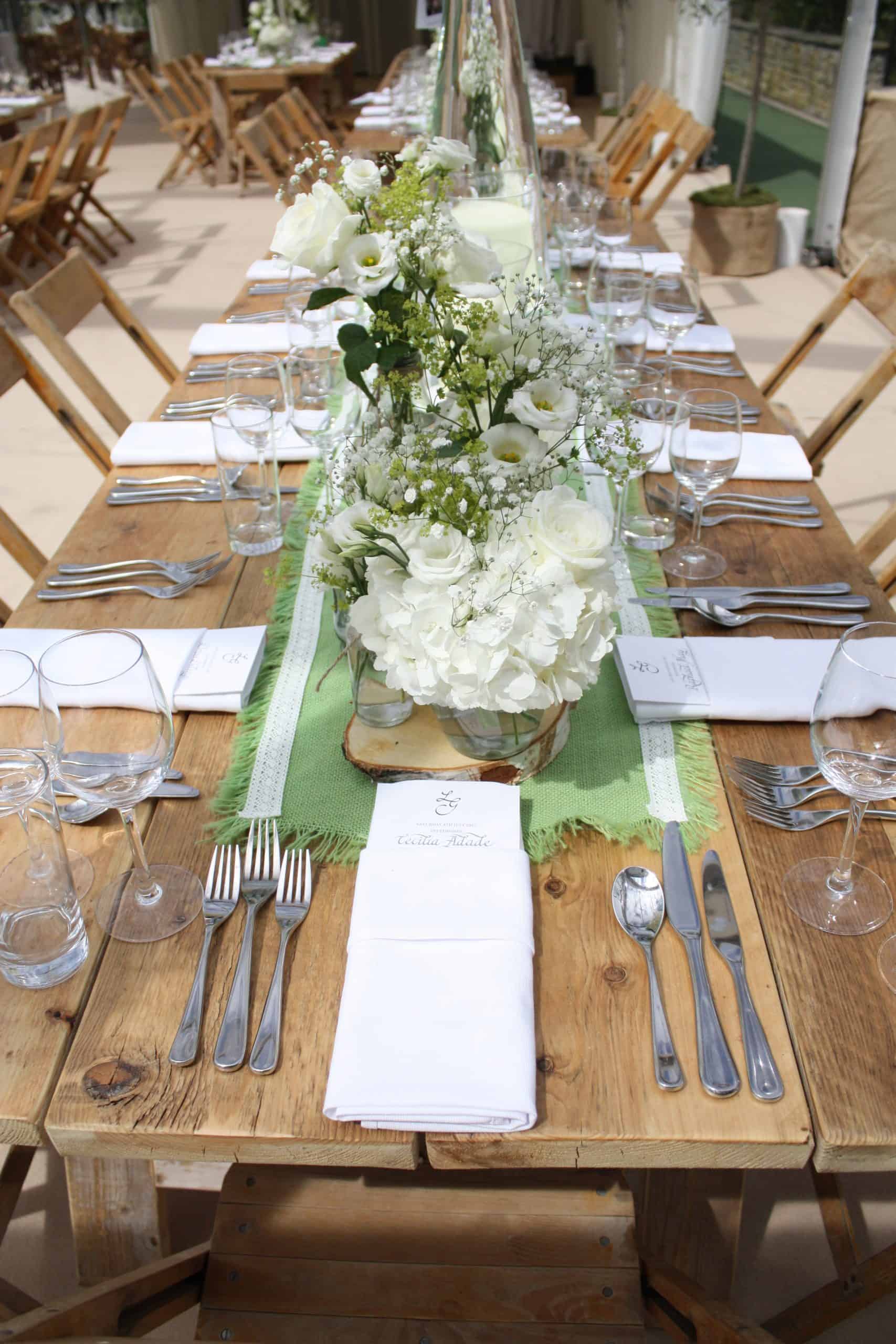 Beautiful Bristol Back Garden Wedding - white floral, green runner, rustic tables centrepieces in marquee